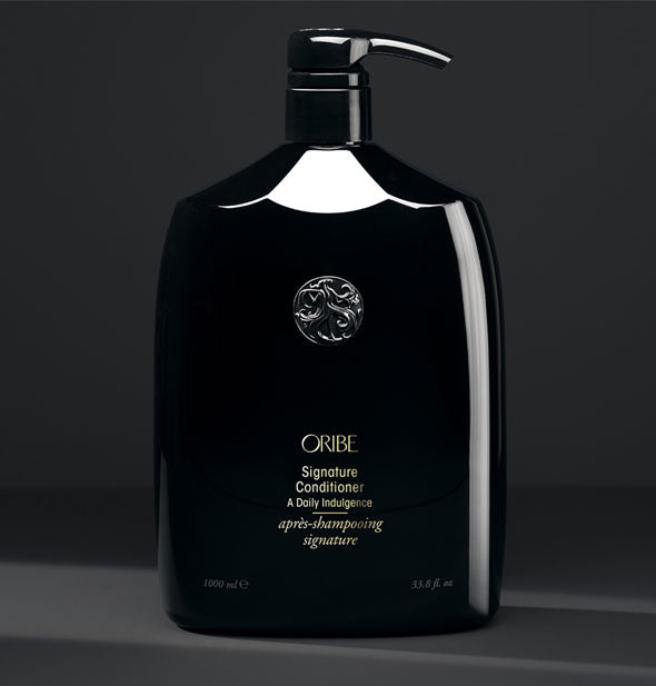 33.8 ounce bottle of Oribe Signature Conditioner