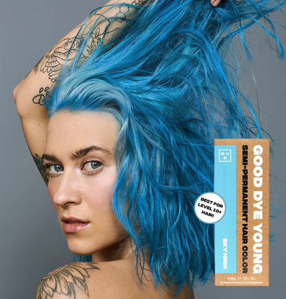 Model with bright blue hair color by Good Dye Young in the shade Sky High