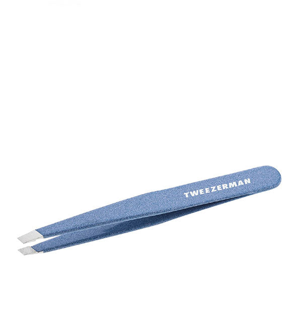 Blue finely speckled-effect tweezer with slanted stainless steel tips and "Tweezerman" logo printed on the handle