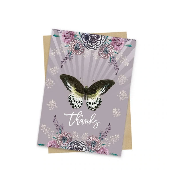 Muted purple greeting card with intricate floral and butterfly design says, "Thanks" in white script near the bottom
