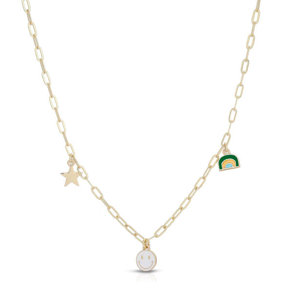Gold necklace chain with gold star, white smiley face, and mini rainbow enamel charms hanging from it
