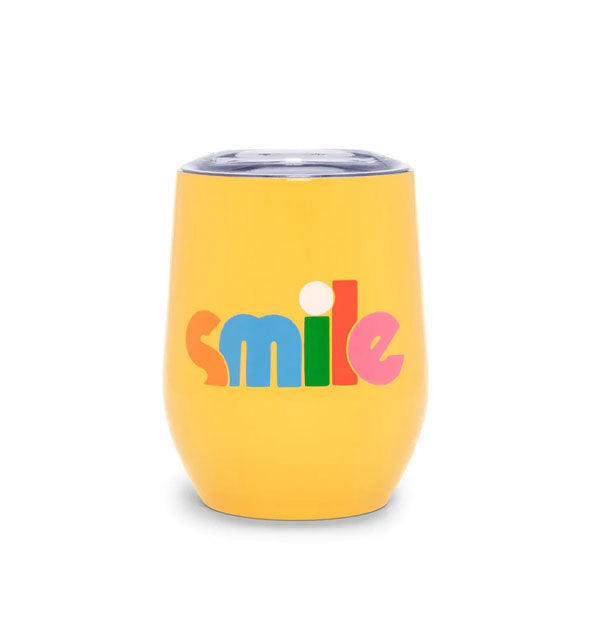 Yellow wine tumbler with clear plastic lid says, "Smile" in colorful lettering