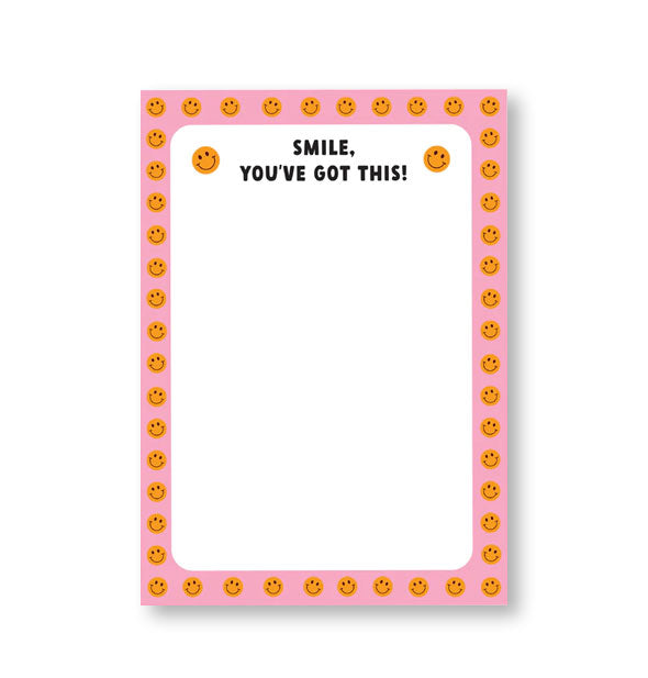 Rectangular white notepad with pink and orange smiley face border says, "Smile, you've got this!" in black lettering flanked by two orange smiley faces