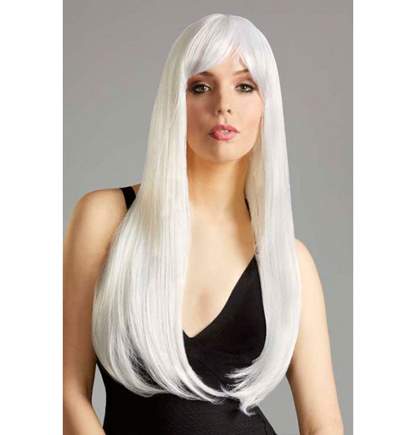 Model wearing a long, pure white wig with bangs.