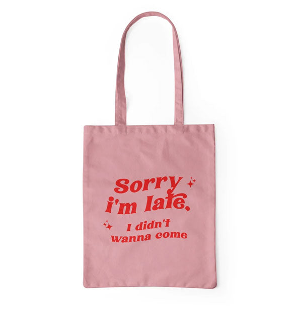Rectangular pink tote bag says, "Sorry I'm late, I didn't wanna come" in red lettering with star accents