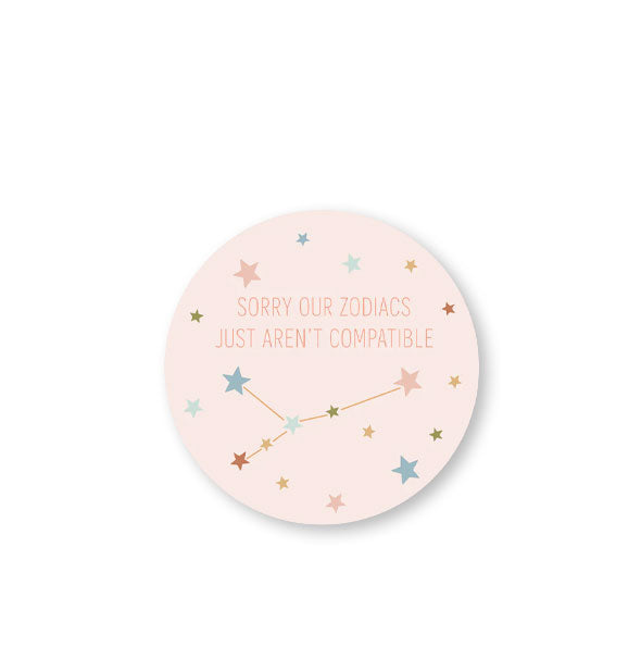 Round light pink sticker featuring pastel stars and constellation design says, "Sorry our zodiacs just aren't compatible"