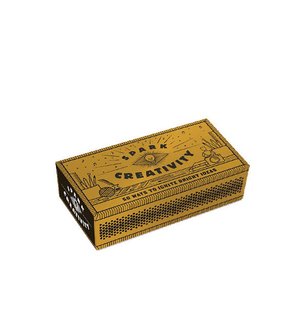 Decorative brown and gold Spark Creativity box features illustrations of pencils, pens, ball of yarn, books, and a camera on a deskop