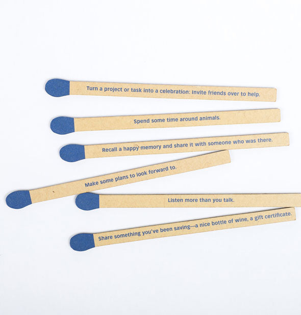 Faux matchsticks are printed with advice to promote happiness
