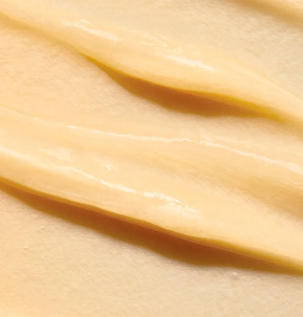 Creamy golden conditioner closeup