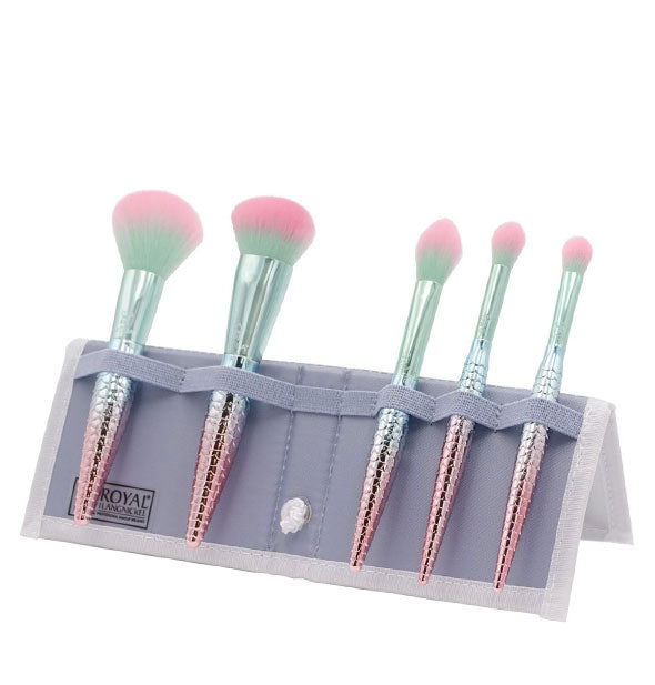 Makeup brush kit with stand-alone holder features metallic ombré handles that resemble mermaids' tails