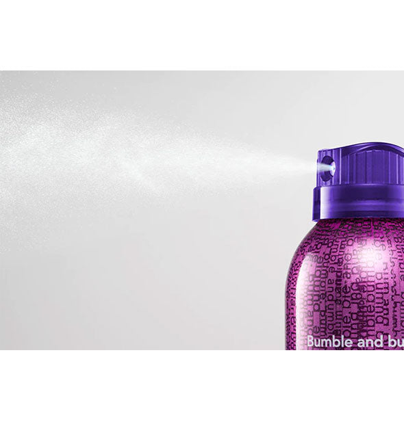 A fine mist is dispensed from a can of Bumble and bumble Spray de Mode Flexible Hold Hairspray