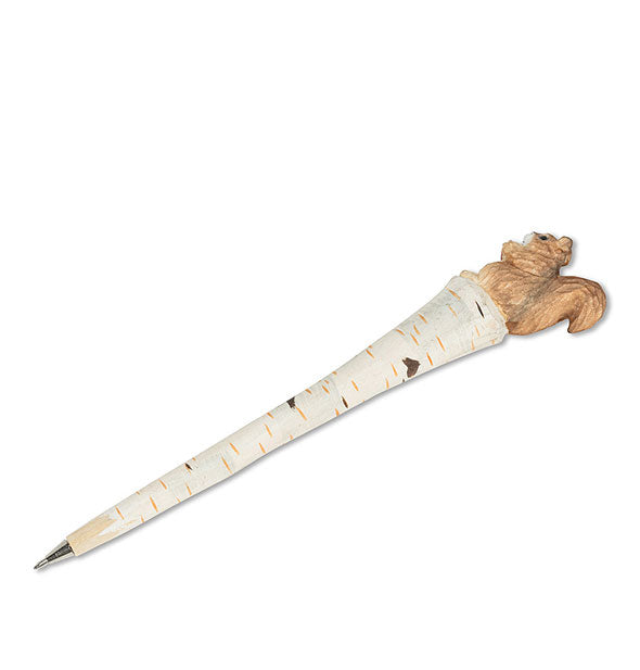 Ballpoint pen resembling a white birch brach features a carved squirrel topper