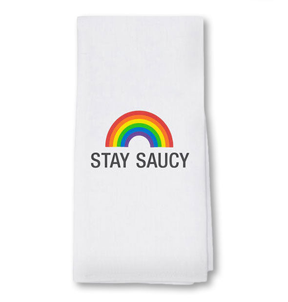 White towel with rainbow graphic says "Stay Saucy" in black lettering