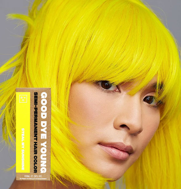 Model with bright yellow hair color by Good Dye Young in the shade Steal My Sunshine