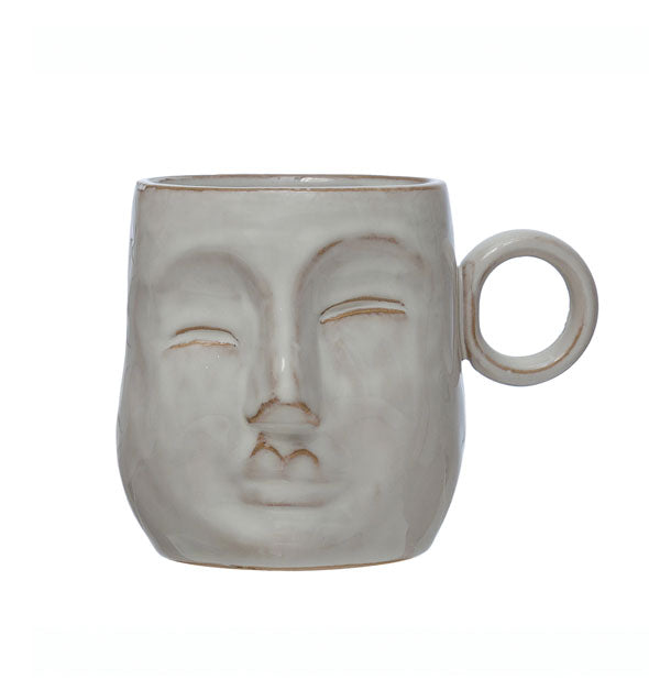 Gray face-shaped stoneware mug with circular handle