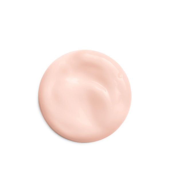 Droplet of Emience Strawberry Rhubarb Hyaluronic Hydrator is creamy and slightly pink in color