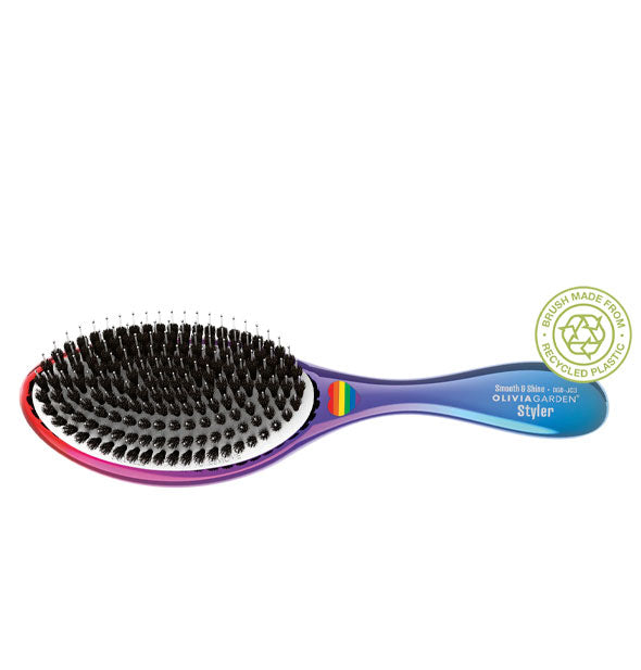 Olivia Garden Detangler hairbrush with red-purple-blue ombre coloring and a rainbow heart logo at center features a recycled materials badge