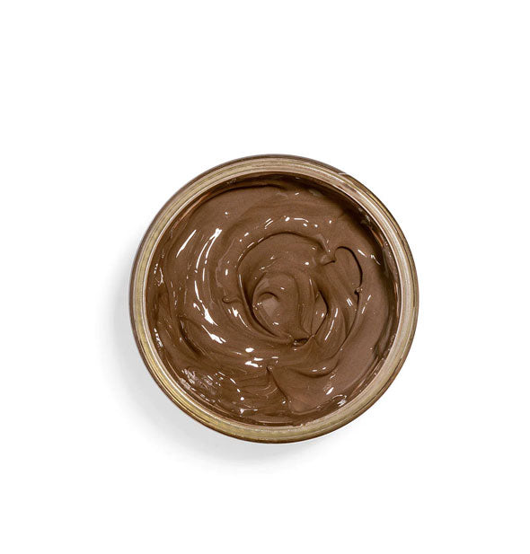 Top view of a pot of chocolate face mask