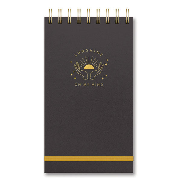 Dark gray notebook cover is bound with gold wire and features a gold elastic band at bottom with "Sunshine on My Mind" hands design in gold foil