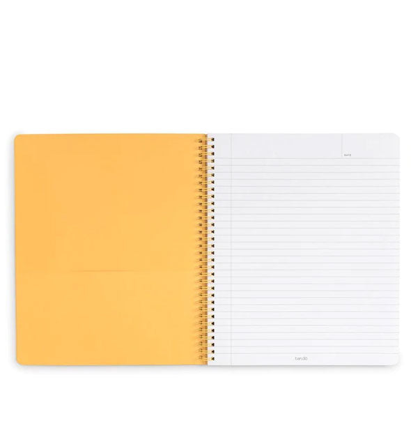 Open notebook with yellow spiral-bound lined and yellow pocket pages