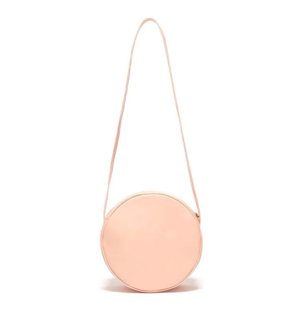 Round peach-pink bag with long strap