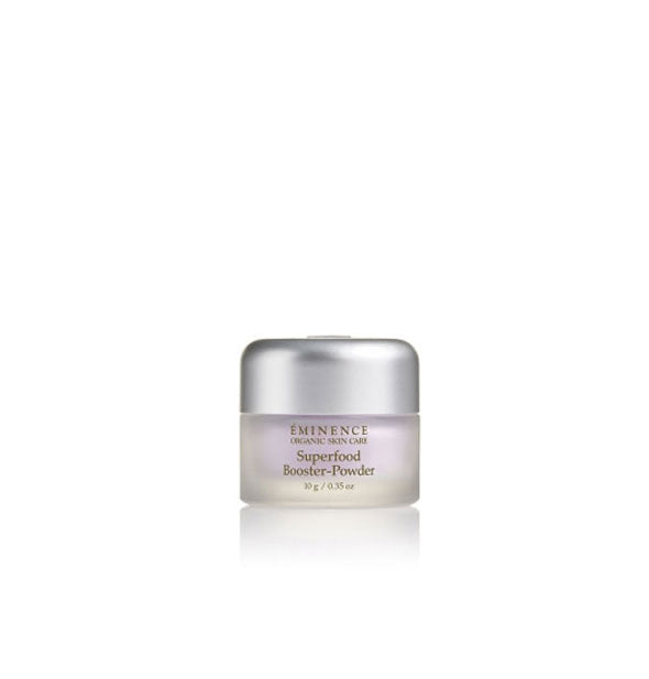 Small frosted glass pot of Eminence Organic Skin Care Superfood Booster-Powder with purplish contents and a silver cap