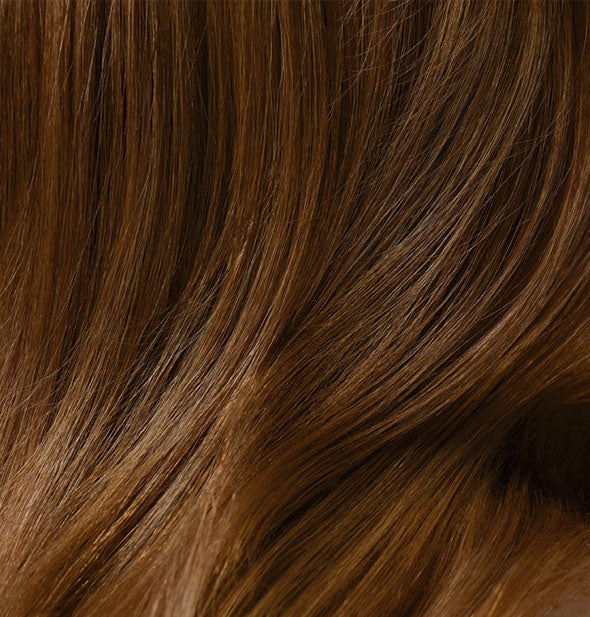 Closeup of hair that is styled with Oribe Supershine Moisturizing Cream
