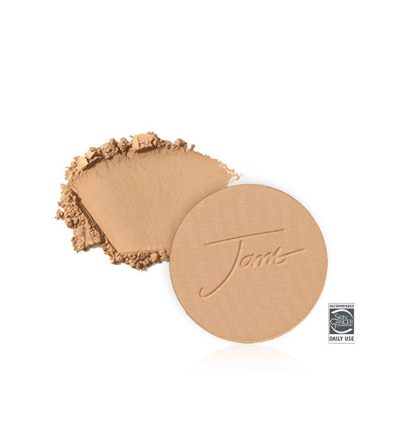 Jane Iredale PurePressed Base Mineral Foundation Refill with sample product swatch behind in the shade Sweet Honey