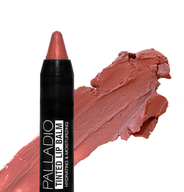 Stick of Palladio Tinted Lip Balm with pointed tip and sample application behind in the shade Sweet Peach