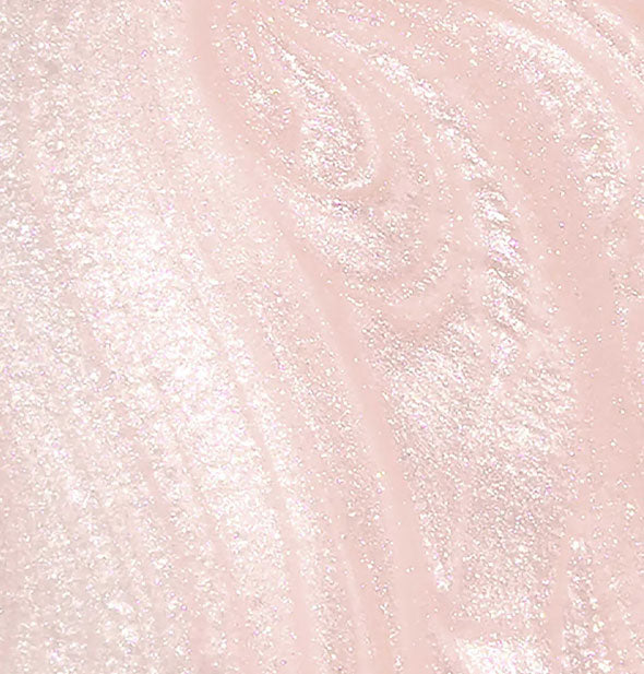 Closeup of pearlescent pink nail polish
