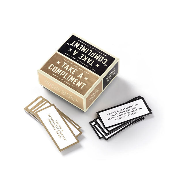 Box of Take a Compliment cards with some gold- and black-rimmed cards removed