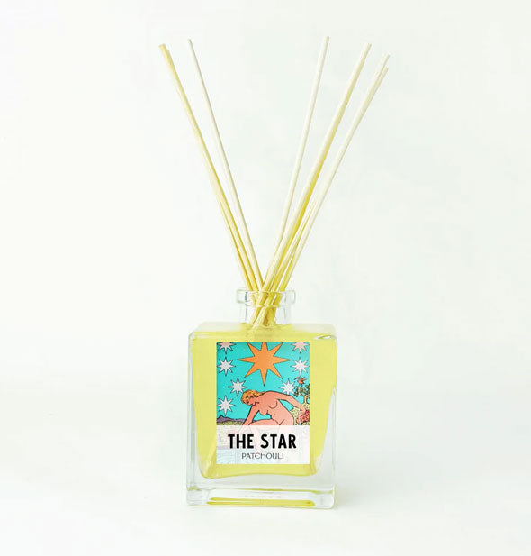 The Star tarot card reed diffuser bottle with reeds emerging from it