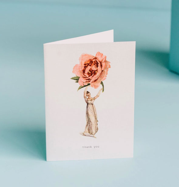 Greeting card with illustration of Victorian woman holding a very large pink rose says, "Thank you"