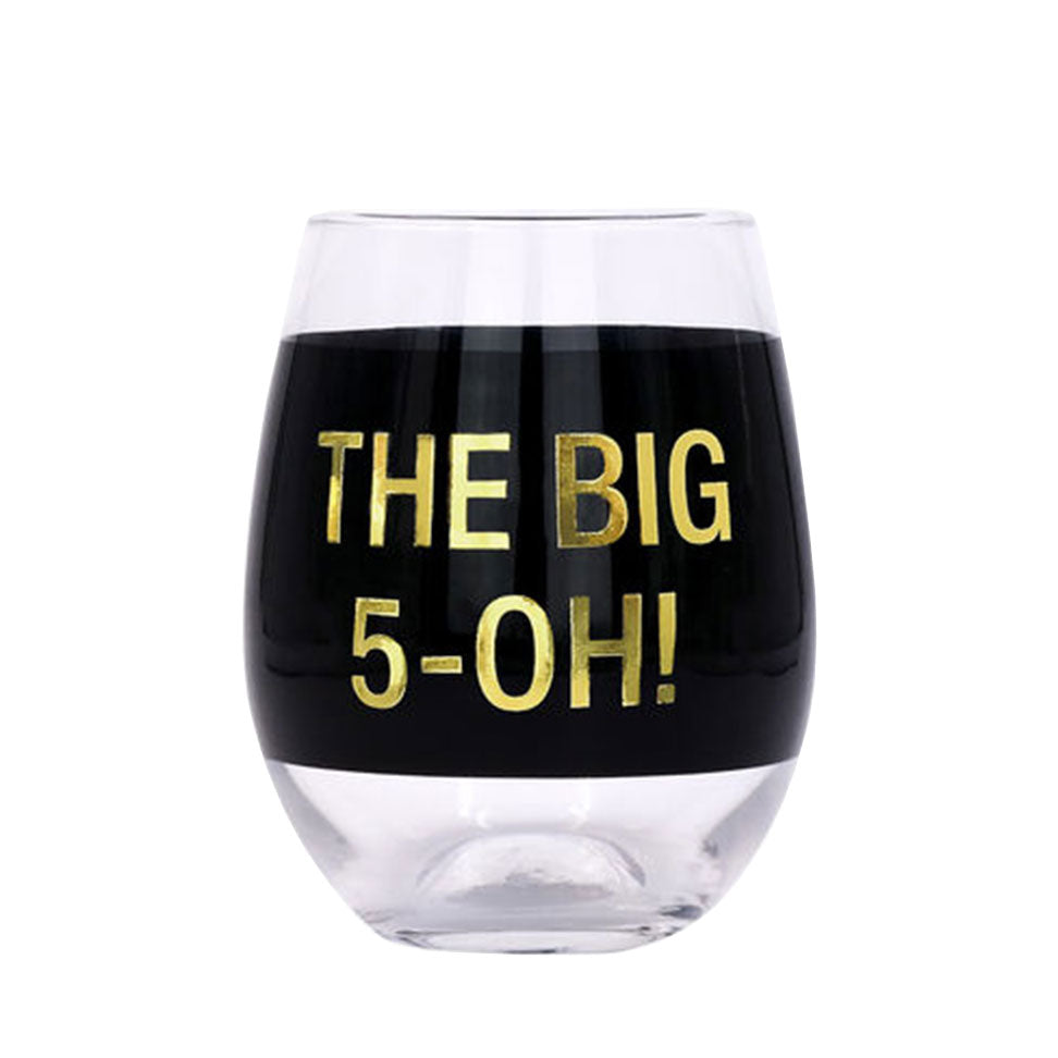 Clear stemless wine glass with black band says, "The big 5-oh!" in gold lettering