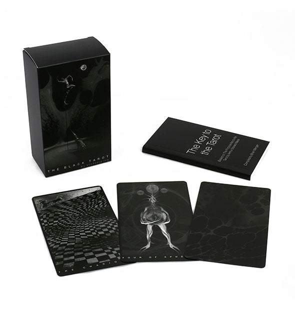 Samples of The Black Tarot with guidebook shown