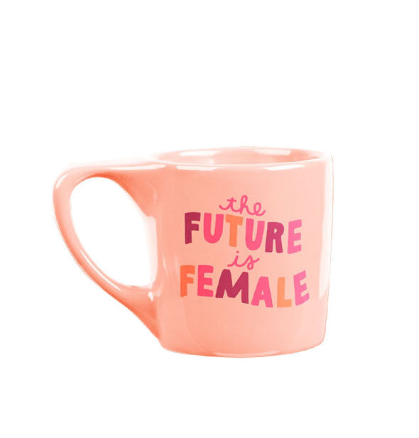 Blush pink mug says, "The Future is Female" in multicolored lettering