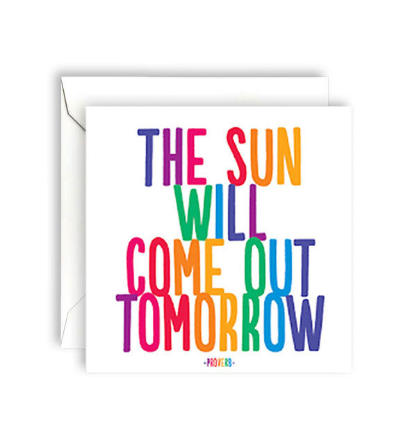 Square white greeting card with envelope is printed with elongated multicolor lettering with the proverb, "The sun will come out tomorrow"