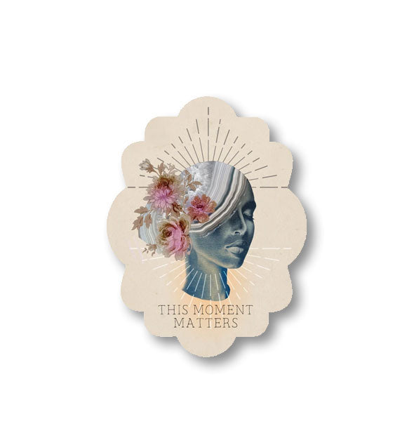 Scalloped-edge sticker with image of woman wearing colorful flowers in her hair says, "This Moment Matters"