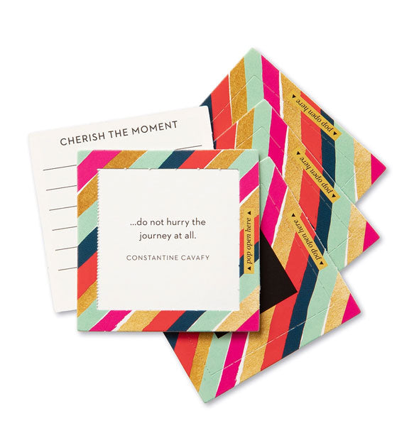 Stack of striped square cards with topmost card featuring a quote by Constantine Cavafy: "...do not hurry the journey at all." Another card says, "Cherish the moment"