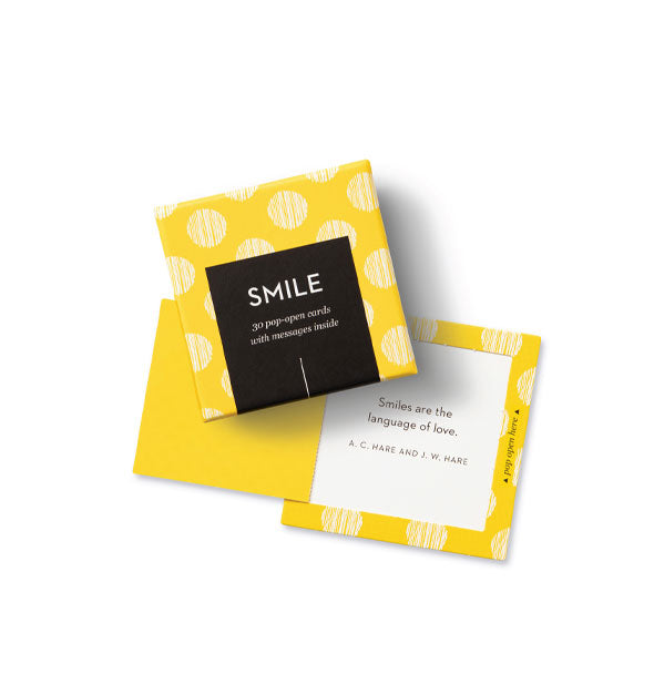 Yellow polkadot Smile box with card that says words by A.C. Hare and J.W. Hare: "Smiles are the language of love."
