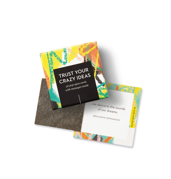 Colorful Trust Your Crazy Ideas box with card that says words by Benjamin Zephaniah: "...we dance to the sounds of our dreams."