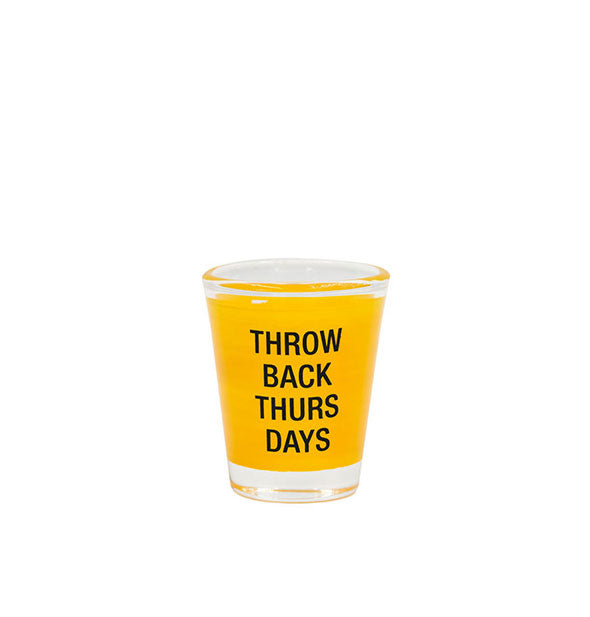 Shot glass with yellow color band says, "Throw back Thursdays" in black lettering