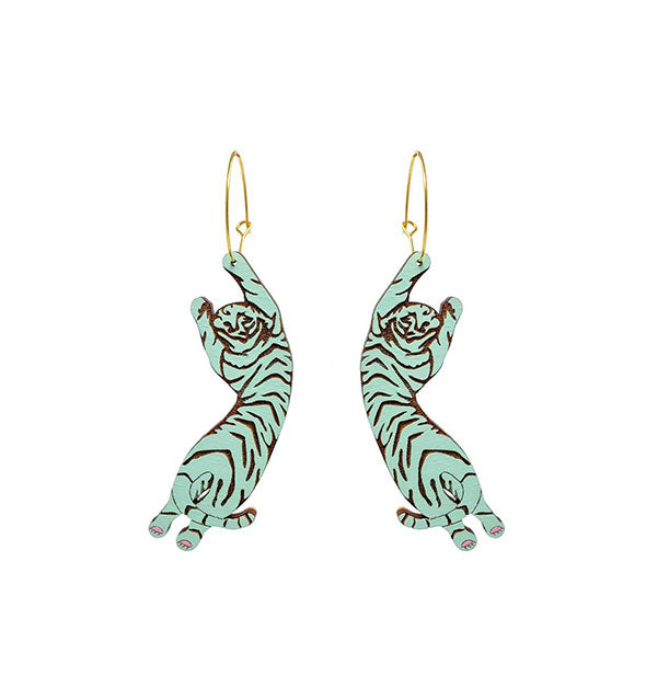 Pair of mint green carved tiger earrings on gold hoops