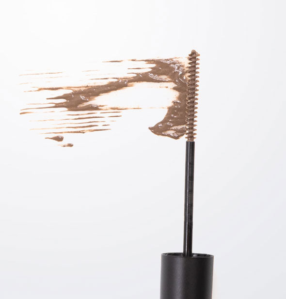 Brow gel wand applicator applies a sample smear of product