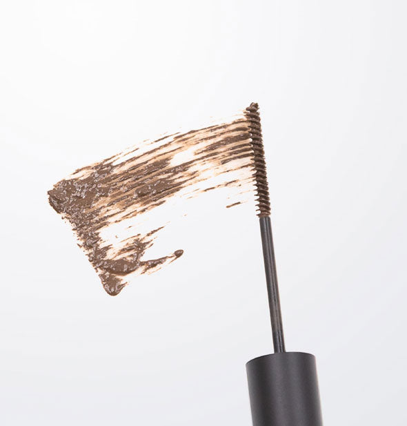 Brow gel wand applicator applies a sample smear of product