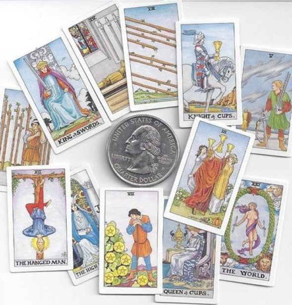 Tiny Universal Waite Tarot card assortment with a US quarter for size reference