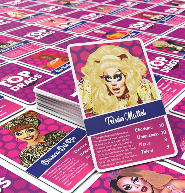 Stack and spread of Top Drags playing cards featuring Trixie Mattel on top