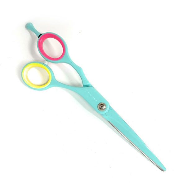 Pair of teal cutting shears with hot pink and yellow finger holes