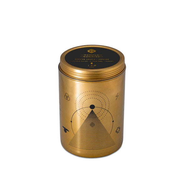 Cylindrical gold candle tin with lid features a fine geometric and astrological silkscreened design in black