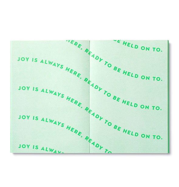 Journal page spread says, "Joy is always here, ready to be help on to."